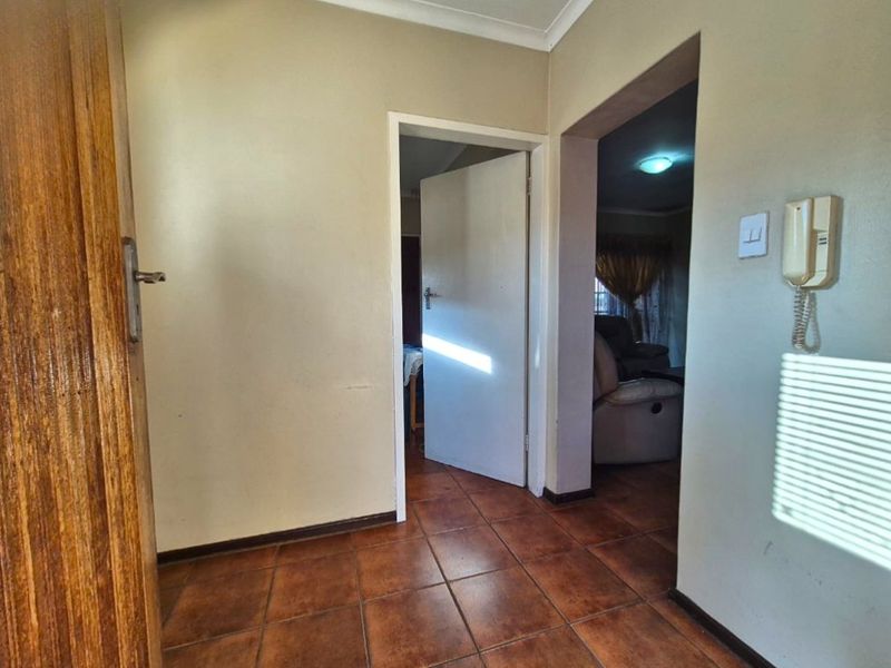 Secure Living with Exceptional Renovation Potential – No Levies - Photo 2