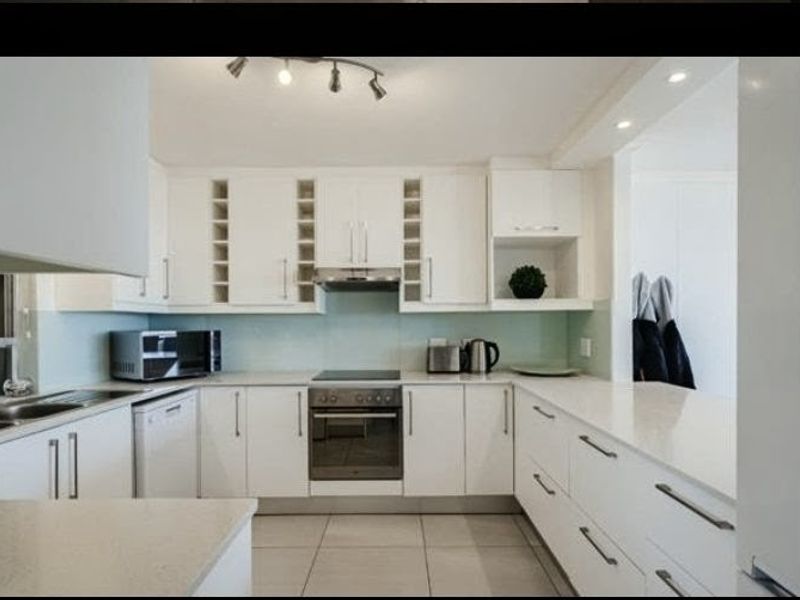 Sophisticated Coastal Living in a Prime Tableview - Photo 6