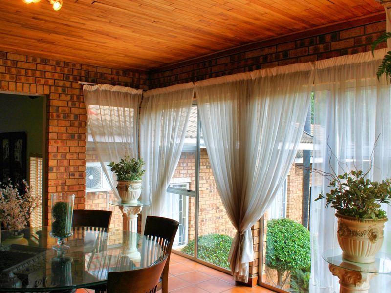 Elegant Space, Effortless Living, with Exceptional Potential in Moreleta Park - Photo 10