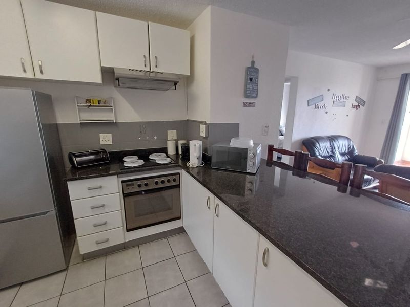 Renovated 2 bedroom apartment with direct beach access - Photo 1