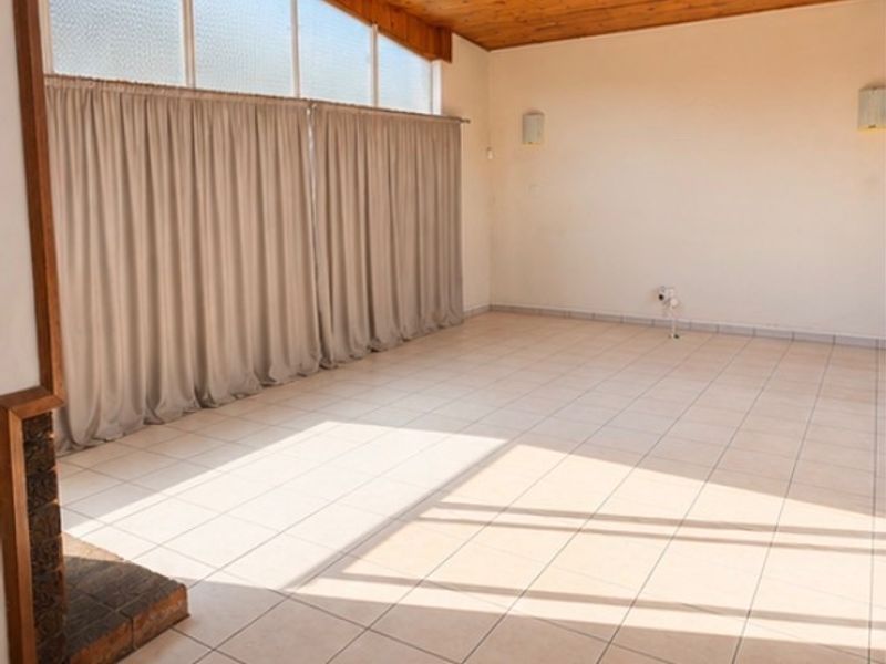 SPACIOUS FAMILY HOME FOR SALE   This beautiful 4-bedroom, 3-bathroom home offers everything a growing family needs  Property Features  4 Spacious bedrooms 3 Neat bathrooms Large modern kitchen with ample cupboard space Spacious lounge and living room Fantastic entertainment area with a built-in braai 2 Garages Generous indoor and outdoor living spaces Perfect for entertaining family and friends  This is a fantastic opportunity to own a spacious family home in a great location.  Don’t miss out! Contact me today to arrange your private viewing - Photo 6