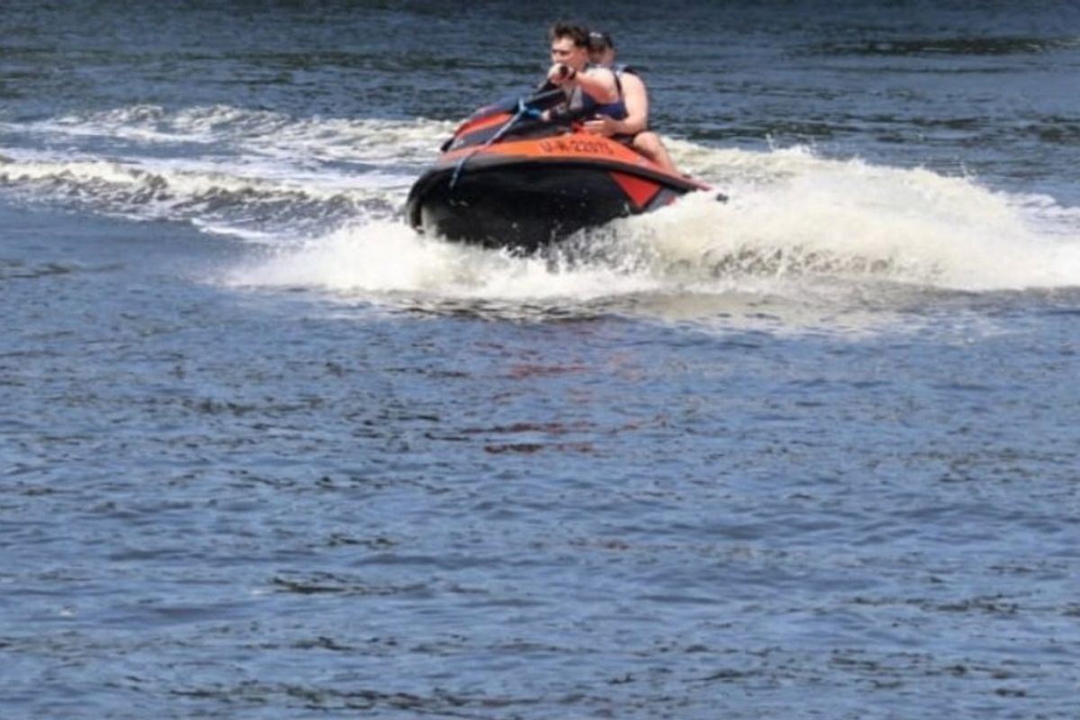 A view of a jet ski on the water, highlighting the recreational potential of the local area.