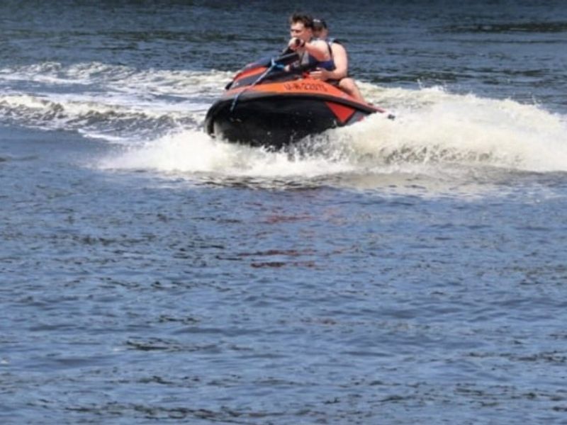 A view of a jet ski on the water, highlighting the recreational potential of the local area.