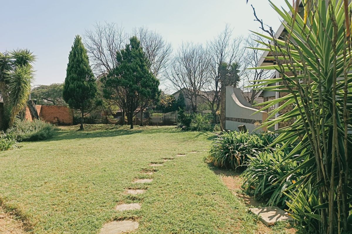 Spacious Family Living with Pool and Entertainer's Dream Backyard in Wilkoppies - Photo 3