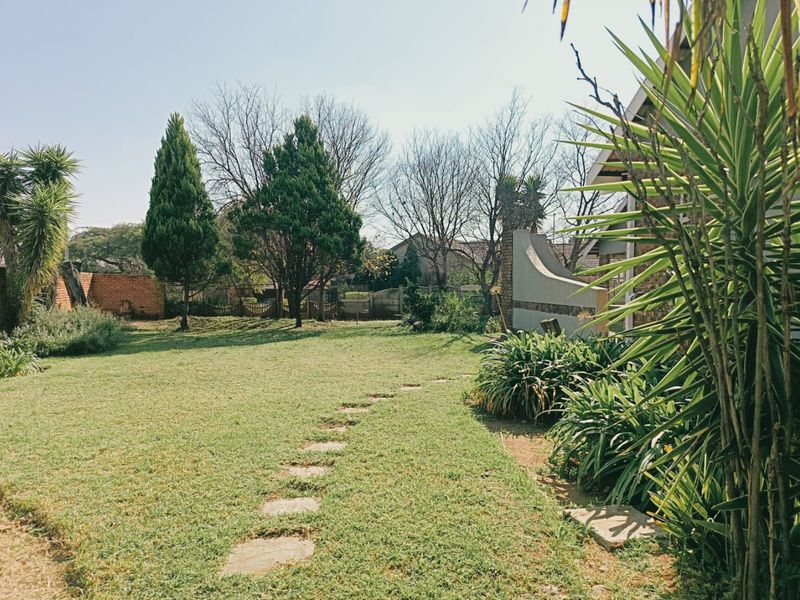 Spacious Family Living with Pool and Entertainer's Dream Backyard in Wilkoppies - Photo 3