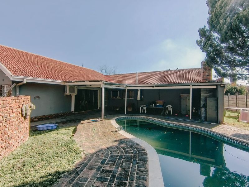 Spacious Family Living with Pool and Entertainer's Dream Backyard in Wilkoppies - Photo 8