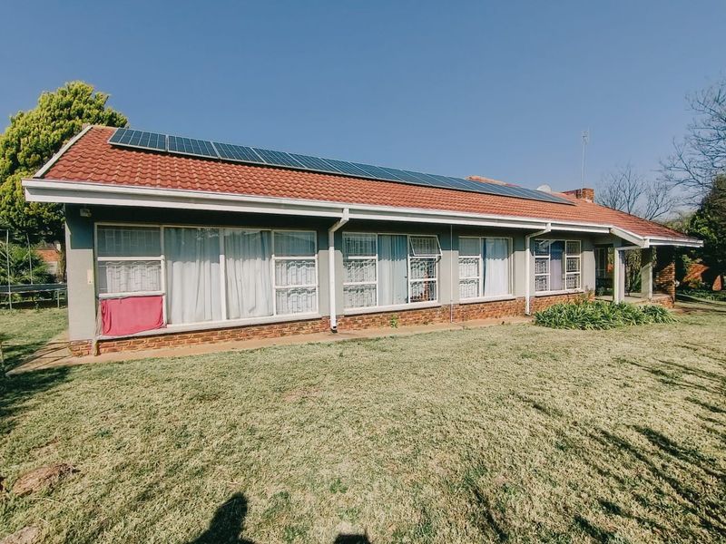 Spacious Family Living with Pool and Entertainer's Dream Backyard in Wilkoppies - Photo 7