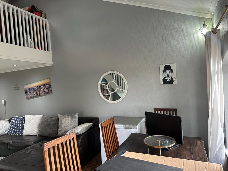 Contemporary 1-Bedroom Loft with Private Pet-Friendly Garden and Garage in Sought-After Estate - Photo 7