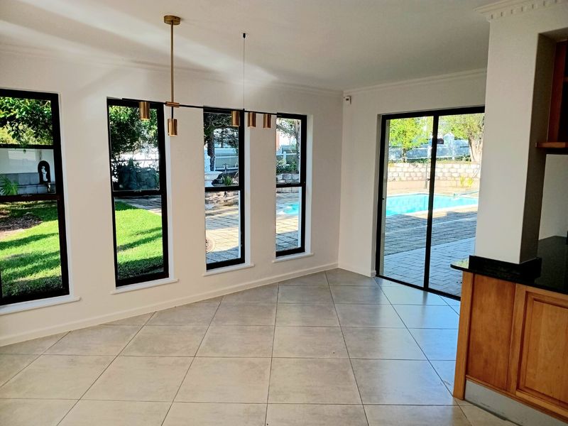 Elegant 5 Bedroom Home in Belvedere Estate with Pool and Lake Access - Photo 7