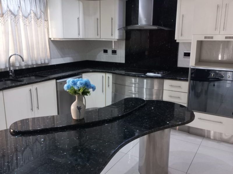 Modern 4 Bedroom home in good location with many Great Features - Photo 10