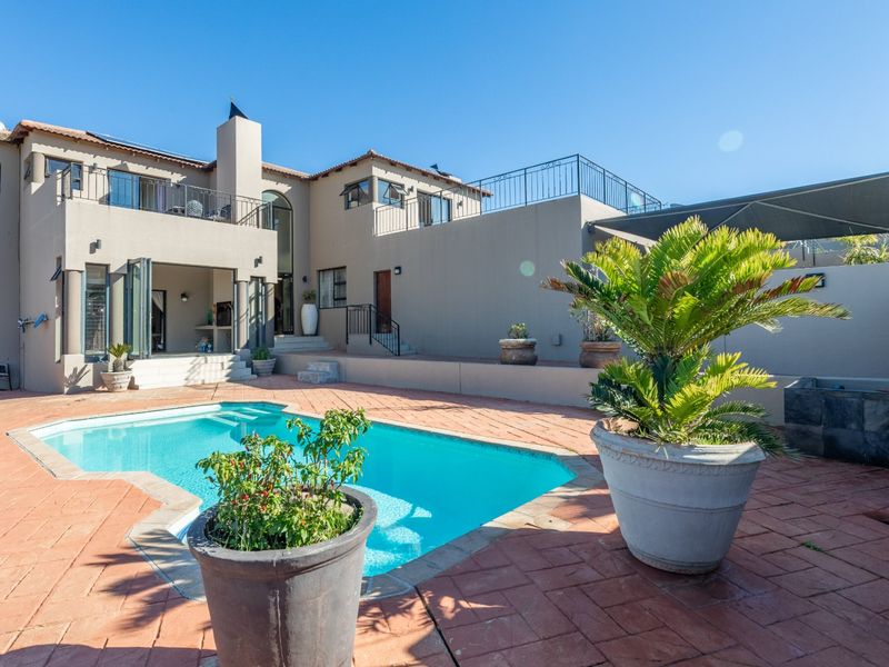 Exceptional Family Home with Panoramic Views in Sought-After West Beach - Photo 3