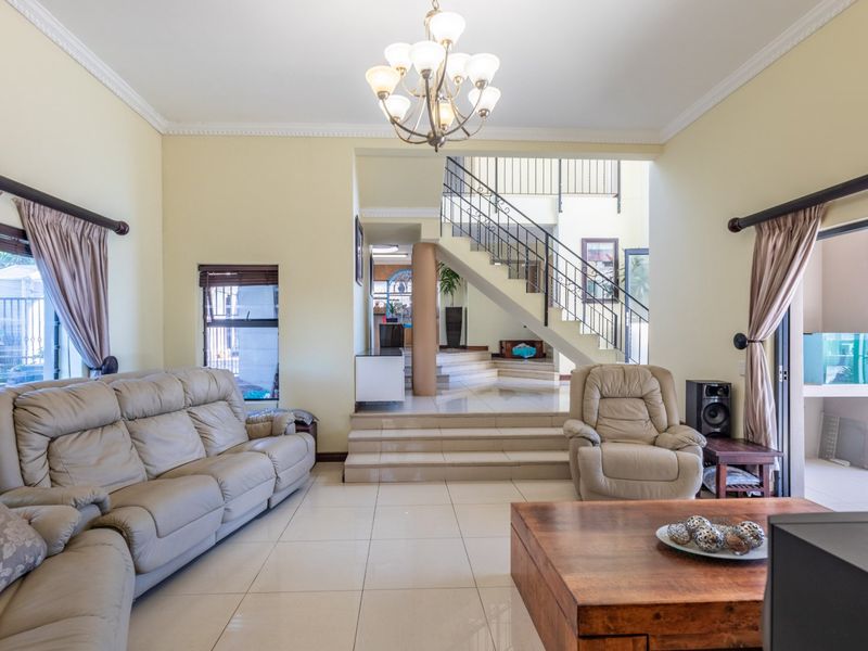 Exceptional Family Home with Panoramic Views in Sought-After West Beach - Photo 6