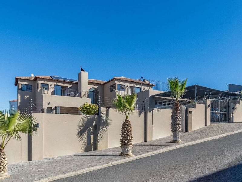 Exceptional Family Home with Panoramic Views in Sought-After West Beach - Photo 1