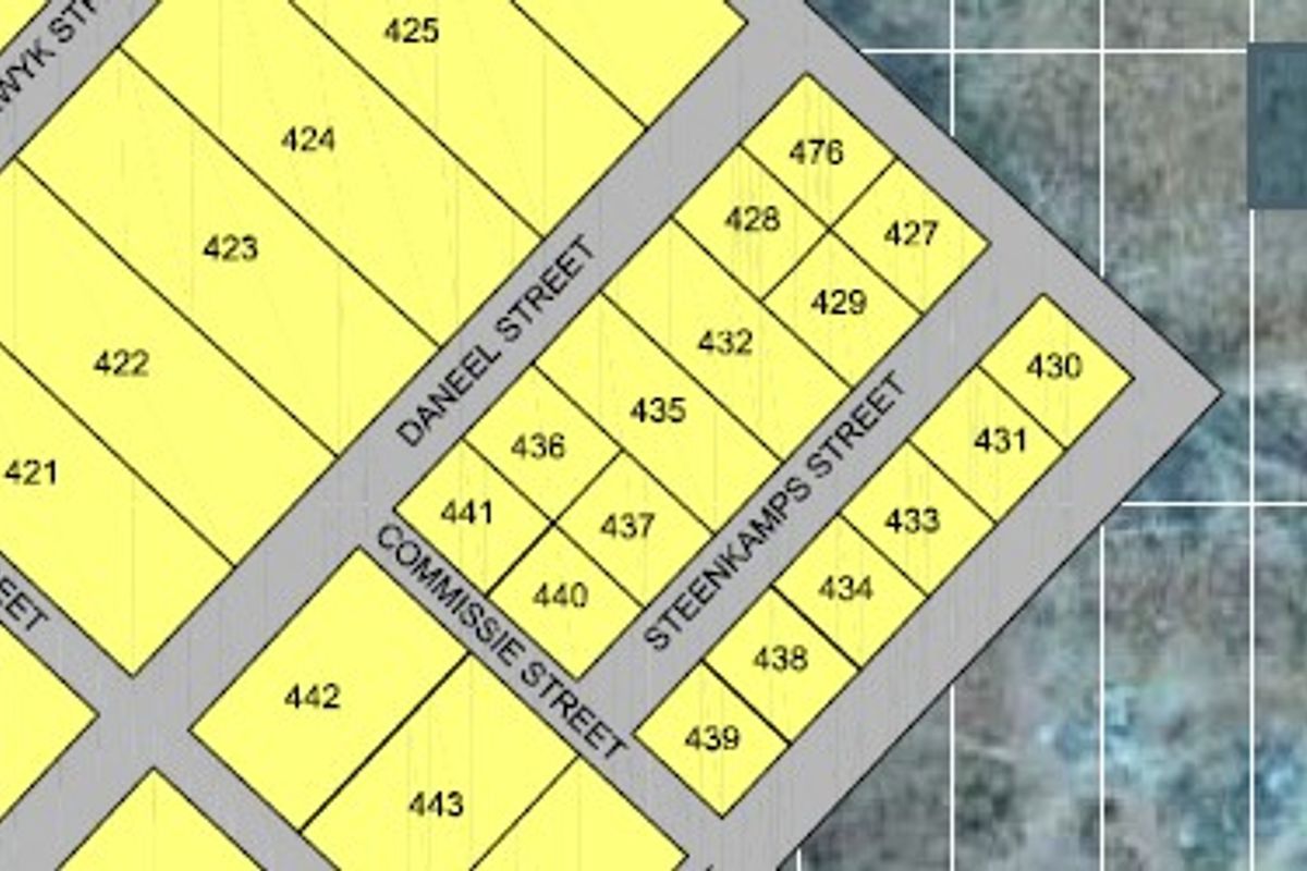 A cadastral map showing the layout and numbering of residential plots within the street network.