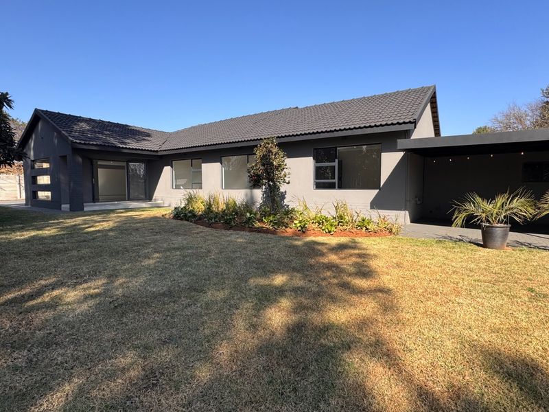 Top-tier four bedroom, three bathroom home in Risiville - Photo 4