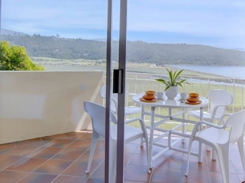 Wake Up to Island Lake Views in This Exceptional Lifestyle Property - Photo 7