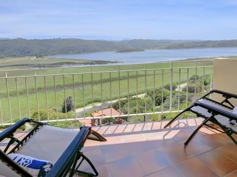 Wake Up to Island Lake Views in This Exceptional Lifestyle Property - Photo 1