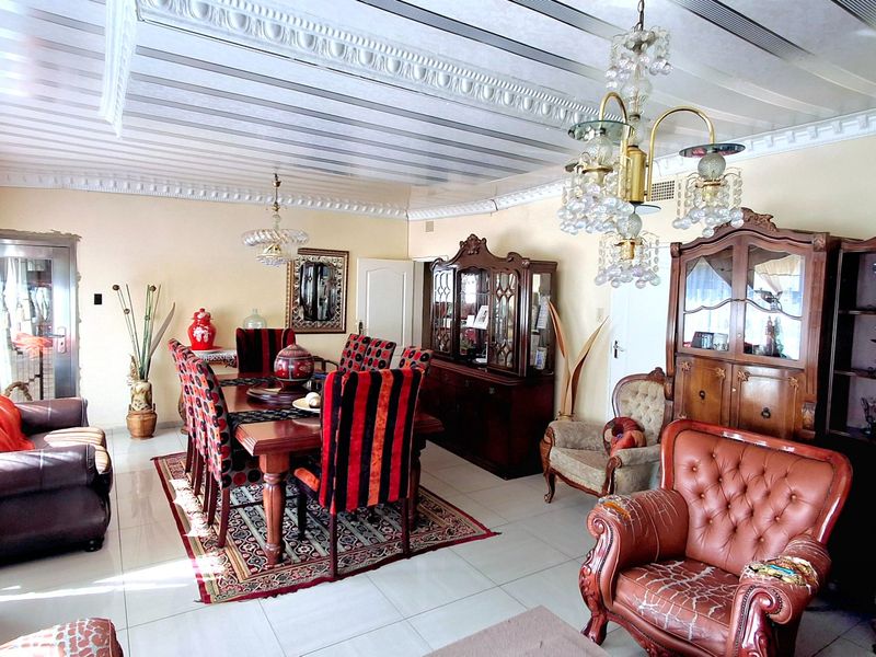 Perfect Location | Excellent Investment Opportunity | 4-Bedroom Family Home - Photo 2