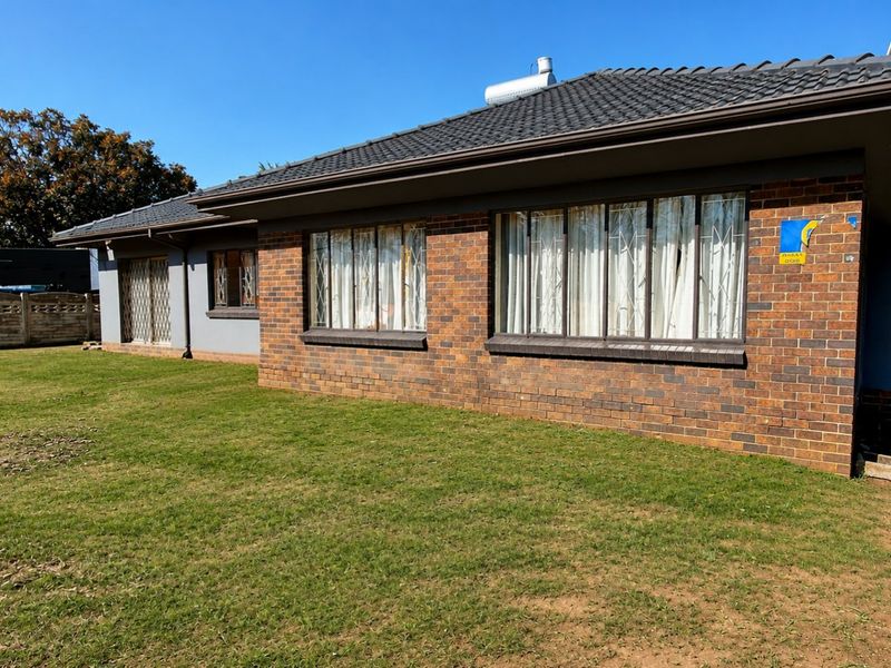 Perfect Location | Excellent Investment Opportunity | 4-Bedroom Family Home - Photo 1