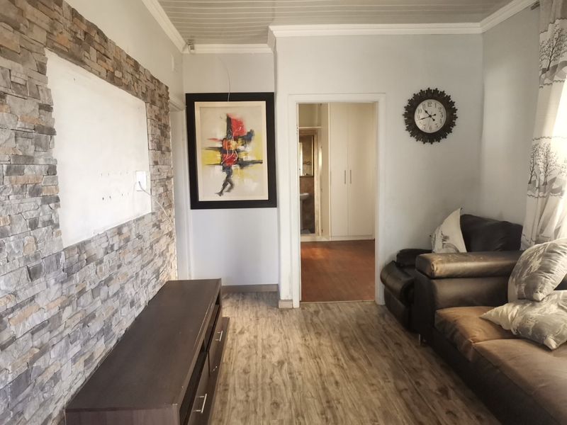 Spacious 3-Bedroom Home with Ample Potential for Expansion - Photo 3