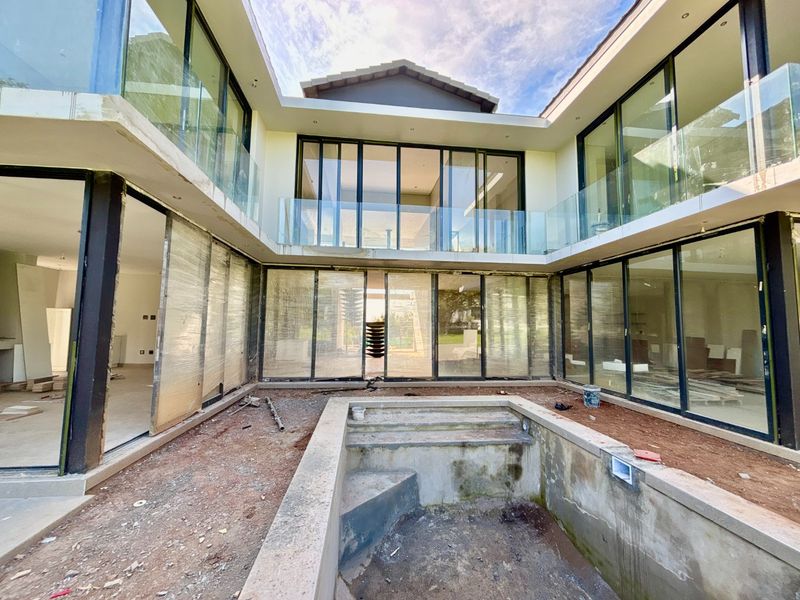 Newly Built Contemporary 5-Bedroom Masterpiece in Copperleaf Golf Estate - Photo 1