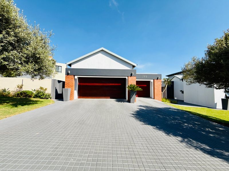 Modern Single Level Family Home on the Green Belt in Copperleaf Golf Estate - Photo 1