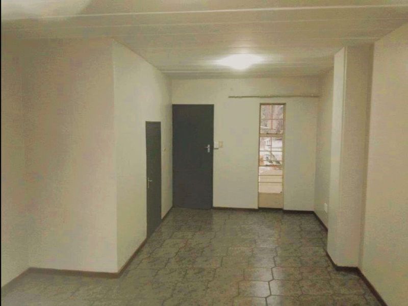 2-Bedroom Duplex with Private Garden - Photo 9