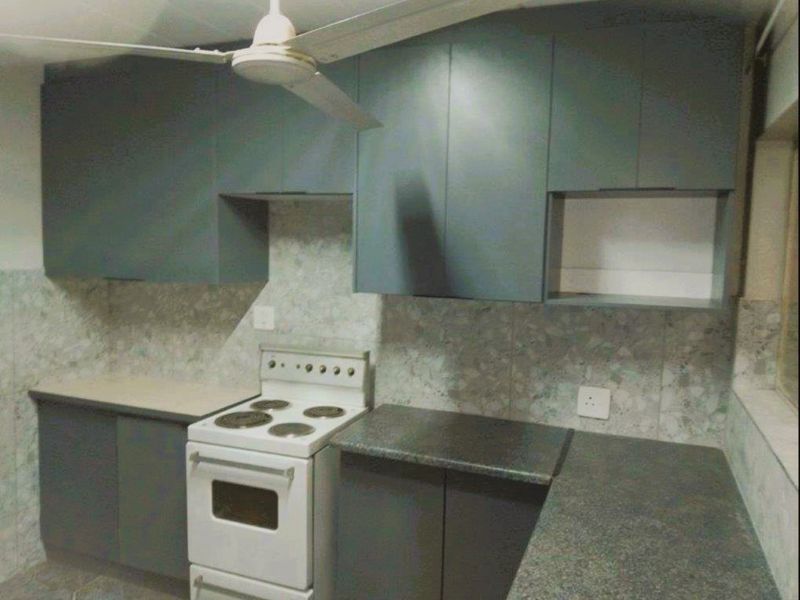 2-Bedroom Duplex with Private Garden - Photo 6