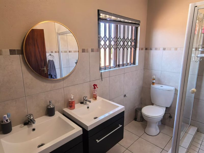 Elegant 4-Bedroom Family Home for Sale in The Quails Estate, Noordwyk, Midrand - Photo 9
