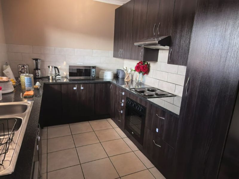Elegant 4-Bedroom Family Home for Sale in The Quails Estate, Noordwyk, Midrand - Photo 6