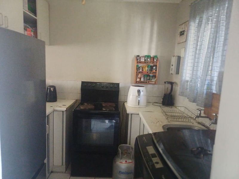 Spacious 2-Bedroom Home with Massive Yard and Incredible Investment Potential in summer greens.  - Photo 4