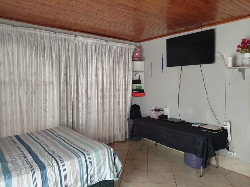 R1,200,000 | Secure 3-Bed Danville Home w/ Garage + Carport + Braai Area - Photo 7