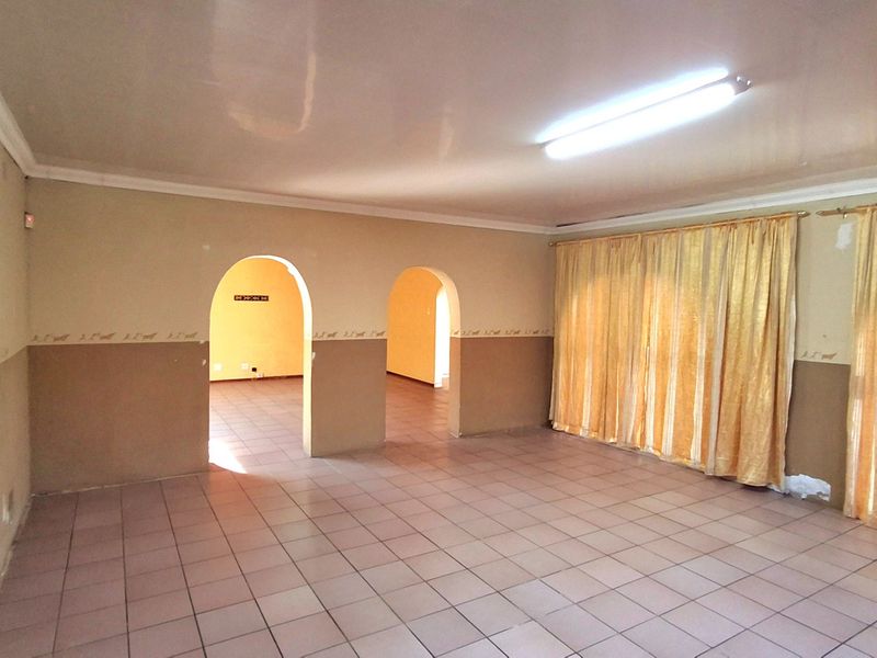 4-Bedroom, 2-Bathroom Family Home with Great Potential - Photo 9