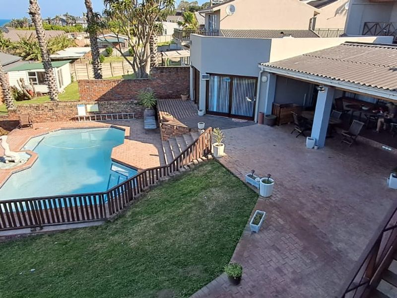 Exceptional Coastal Investment & Lifestyle Property with Panoramic Ocean Views - Photo 1
