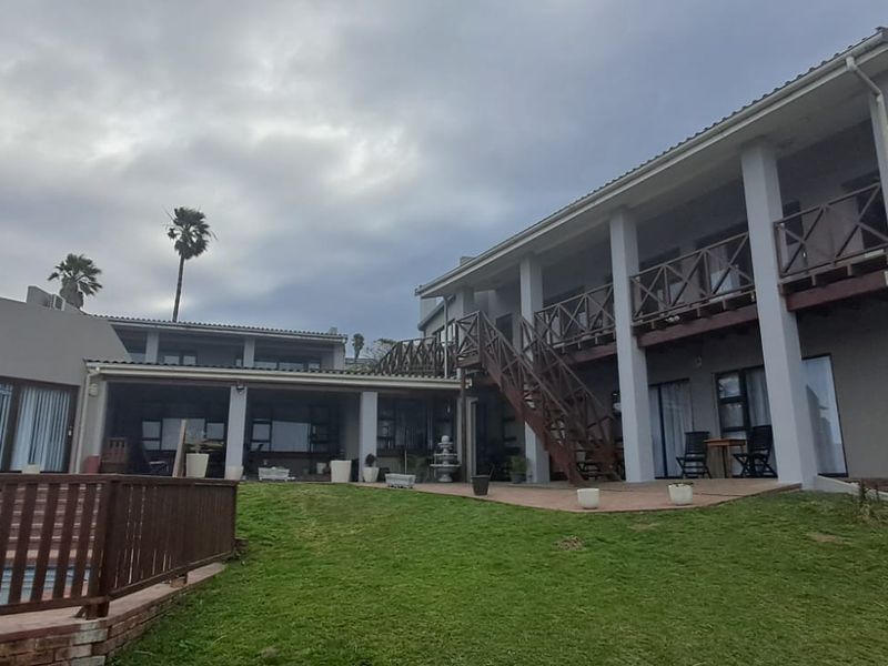 Exceptional Coastal Investment & Lifestyle Property with Panoramic Ocean Views - Photo 3