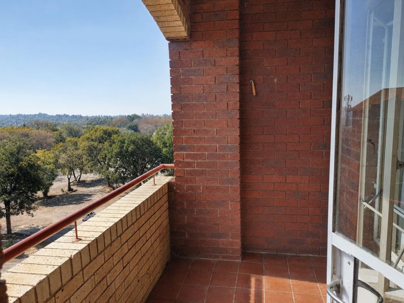 Secure Top Floor Apartment with Scenic Views and Private Balcony - Photo 3