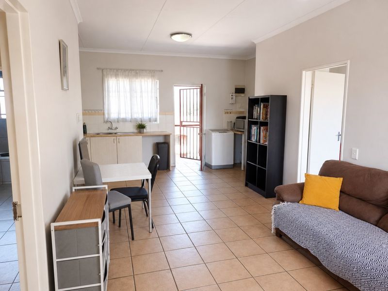 Secure Top Floor Apartment with Scenic Views and Private Balcony - Photo 1