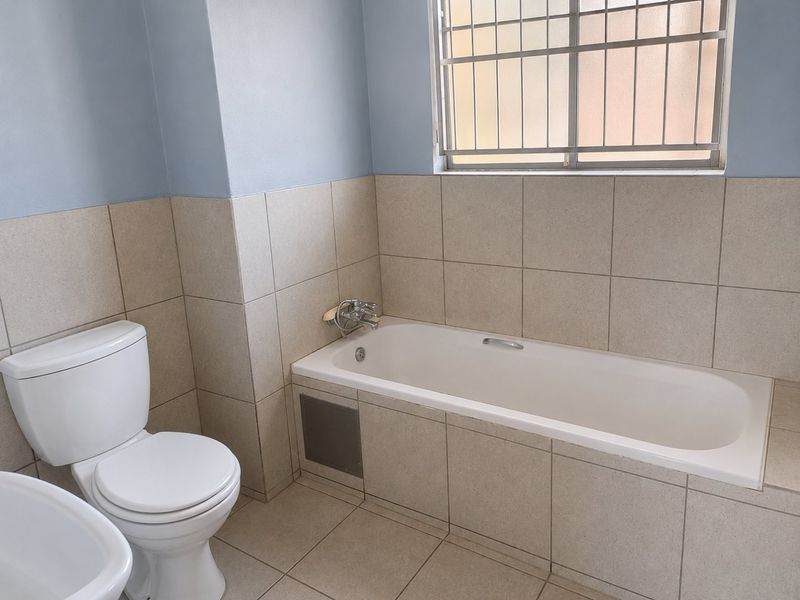 Secure Top Floor Apartment with Scenic Views and Private Balcony - Photo 9