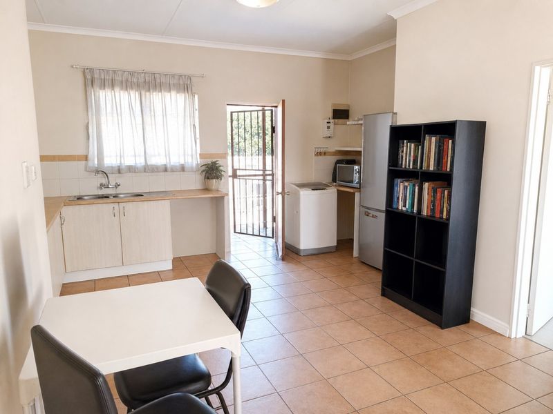 Secure Top Floor Apartment with Scenic Views and Private Balcony - Photo 8