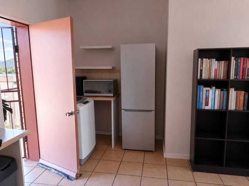 Secure Top Floor Apartment with Scenic Views and Private Balcony - Photo 5
