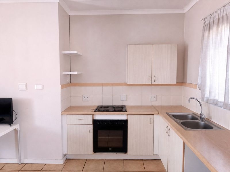 Secure Top Floor Apartment with Scenic Views and Private Balcony - Photo 6