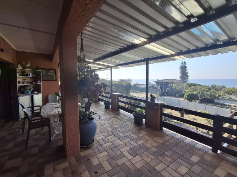 Unique Property Offering Two Homes Under One Roof, Magnificent Ocean Views And Perfectly Positioned On A Corner Stand, One Road From The Beach. An Exceptional Investment Opportunity!!!!!! At An Exceptional Price!!!! - Photo 9
