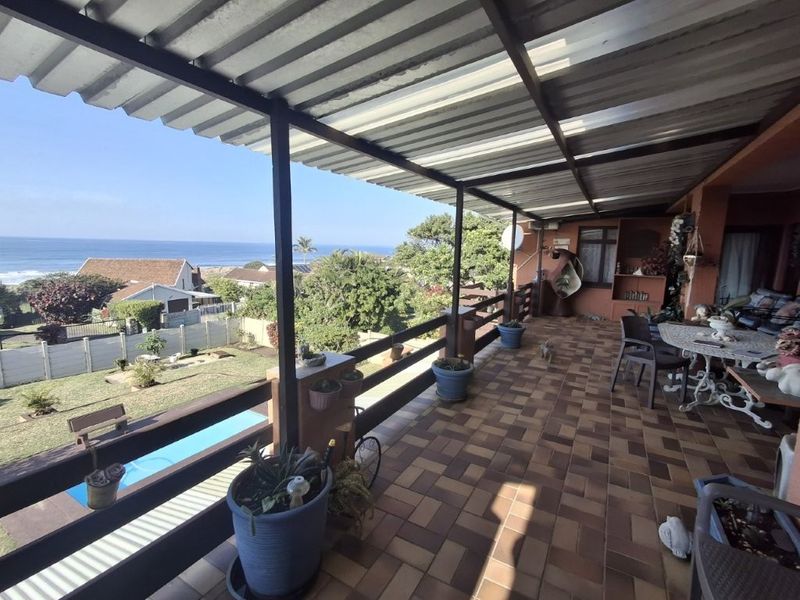 Unique Property Offering Two Homes Under One Roof, Magnificent Ocean Views And Perfectly Positioned On A Corner Stand, One Road From The Beach. An Exceptional Investment Opportunity!!!!!! At An Exceptional Price!!!! - Photo 8