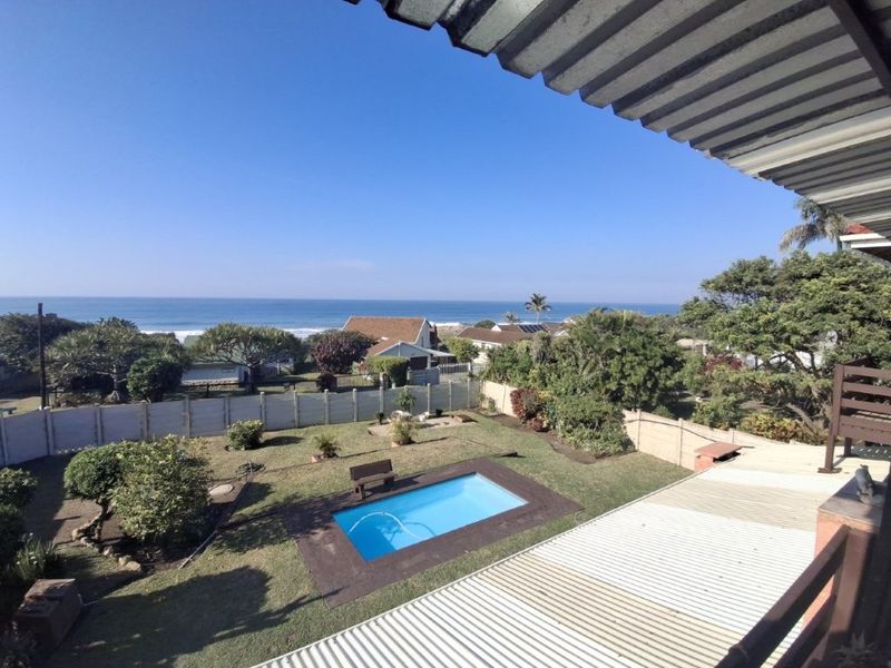 Unique Property Offering Two Homes Under One Roof, Magnificent Ocean Views And Perfectly Positioned On A Corner Stand, One Road From The Beach. An Exceptional Investment Opportunity!!!!!! At An Exceptional Price!!!! - Photo 7