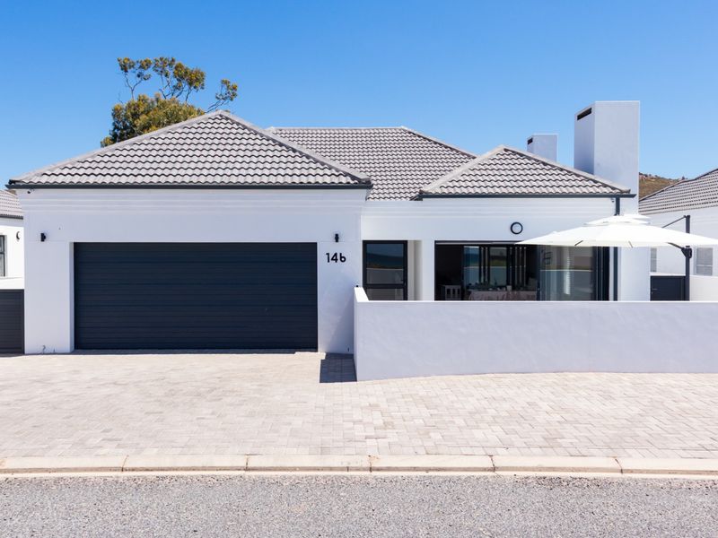 This modern coastal home is perfectly situated just a meters from the beach in the secure and sought-after Sandy Point Beach Estate - St Helena Bay.  - Photo 1