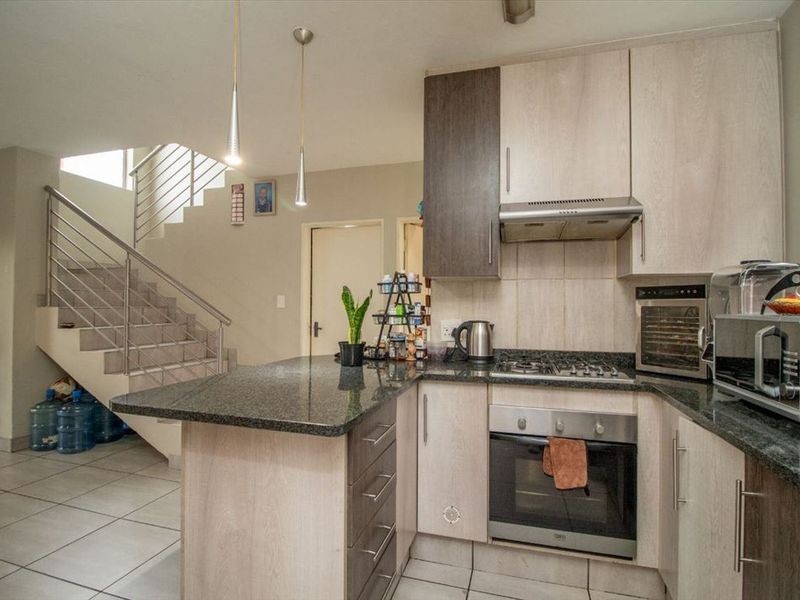 Elegant Family Living With Spacious Comfort - Photo 1
