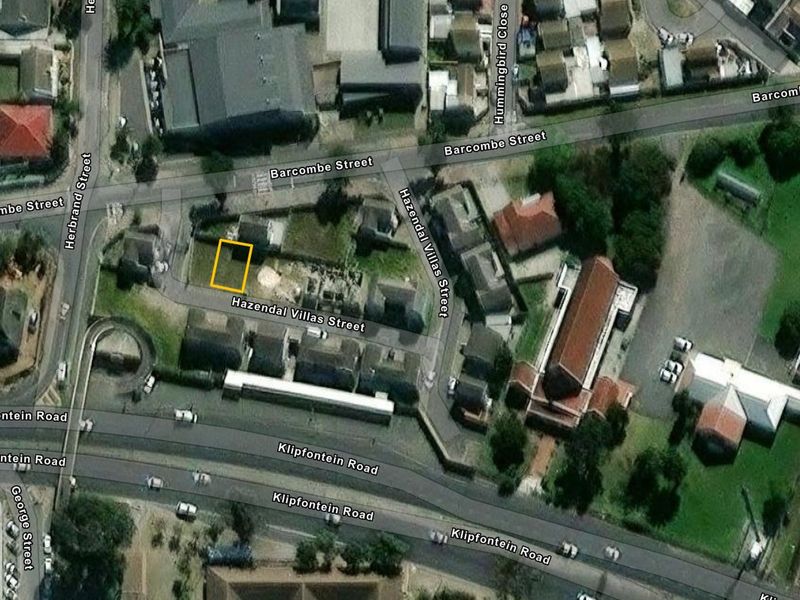 An aerial satellite view of the property location and surrounding street network.