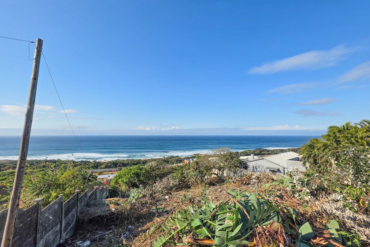 Elevated coastal land offering expansive, unobstructed ocean and horizon views, ideal for a residential build.