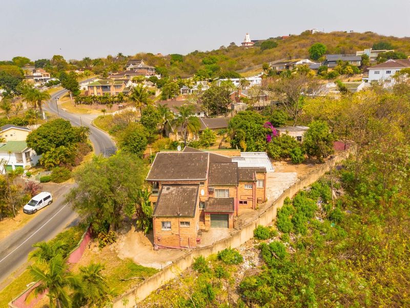 Spacious 7-Bedroom Home with Multiple Living Options in Reservoir Hills - Photo 4