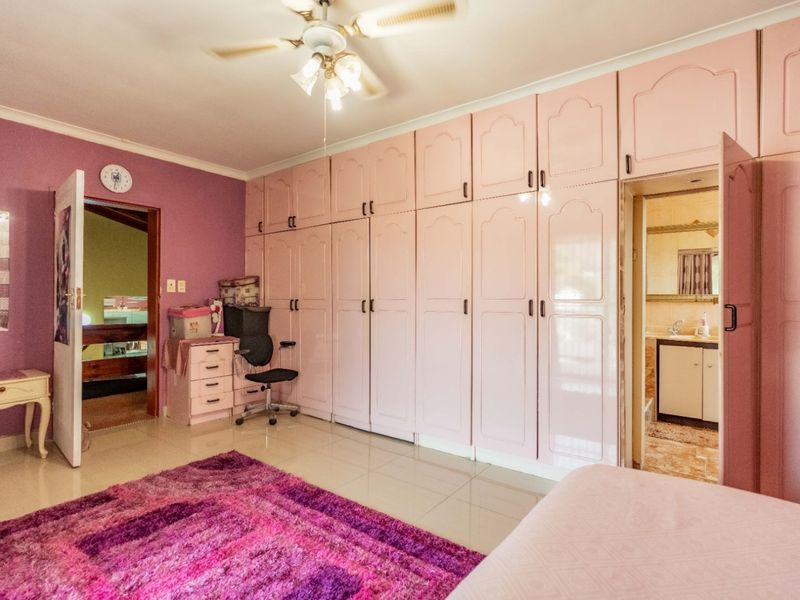Spacious 7-Bedroom Home with Multiple Living Options in Reservoir Hills - Photo 2
